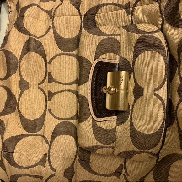 Coach Handbags - Authentic unique pre loved with care shoulder strap Coach purse with large logo.